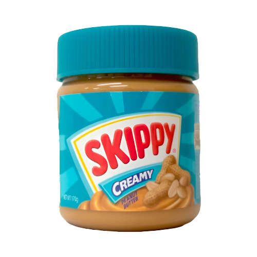 A jar of SKIPPY Creamy Peanut Butter Chunky. The jar is predominantly yellow with a blue lid, and the brand name and product type are clearly visible on the label.