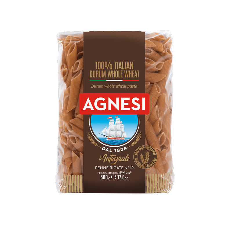 Packaged whole-wheat penne rigate pasta branded Agnesi, with durum whole wheat semolina indicated on the package.