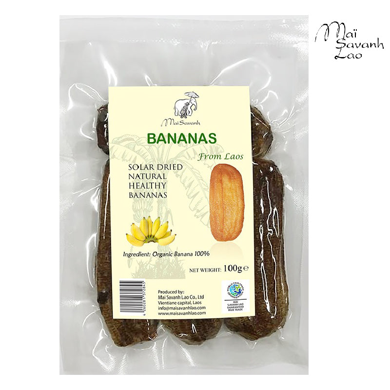 Packaged solar-dried bananas with the brand 'Mai Savanh Lao' visible on the label, indicating organic and fair-trade standards.