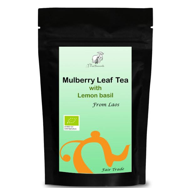 Tea package with green label featuring text and branding on a white background