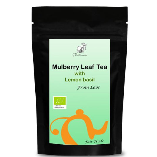 Tea package with green label featuring text and branding on a white background