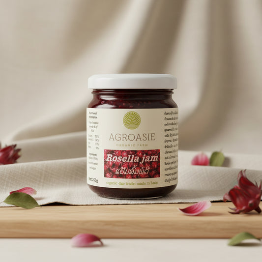 Jar of Agroasie Rosella jam on a white background