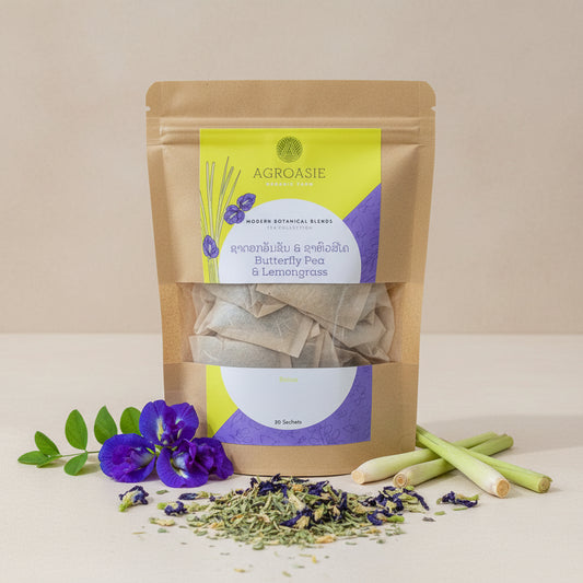 Tea package with Agroasie label featuring butterfly pea and lemongrass on a light background