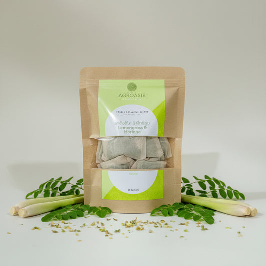 Tea packages with Agroasie branding on a light background