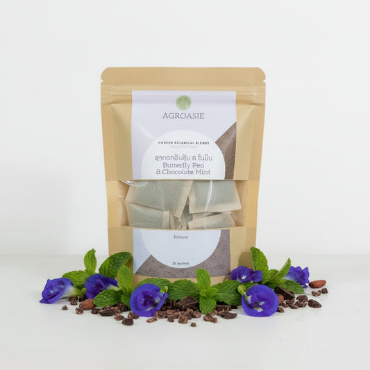 Agroasie butterfly pea and chocolate mint tea packages on a white surface