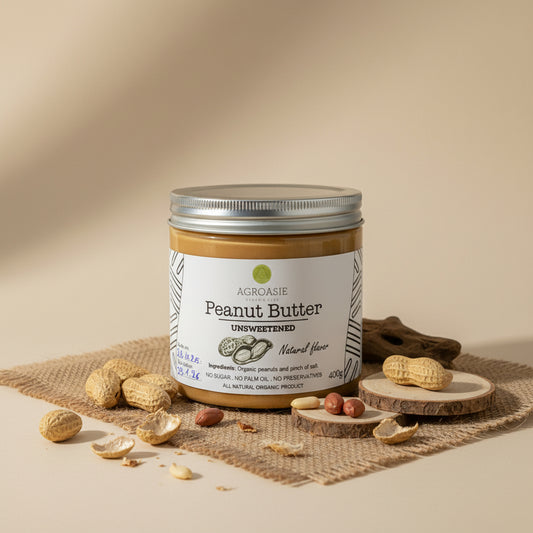 Jar of Agroasie peanut butter on a white background