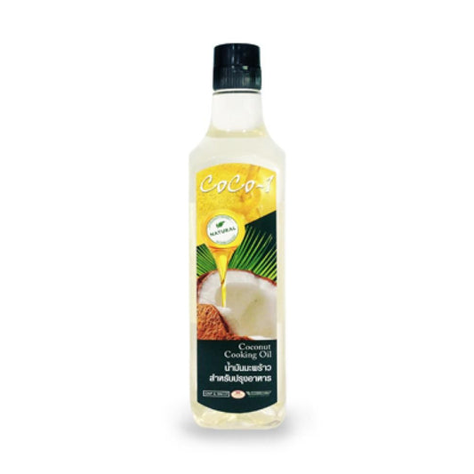 A bottle of Coco-1 Premium Coconut Cooking Oil with a label showing a coconuts and leaves design.