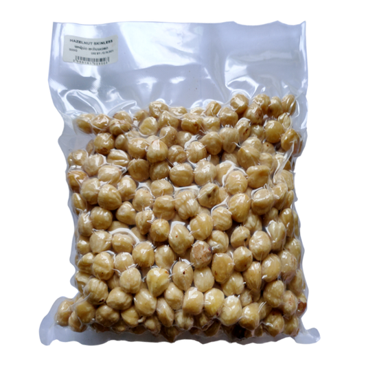 A clear plastic package containing hazelnuts, with visible labeling indicating the brand and possibly the product type.
