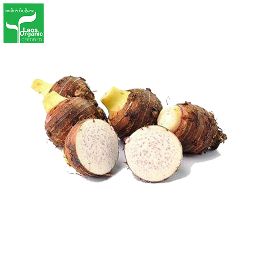 Whole organic taro roots with rough brown skin and a few visible root hairs, displayed on a white background.